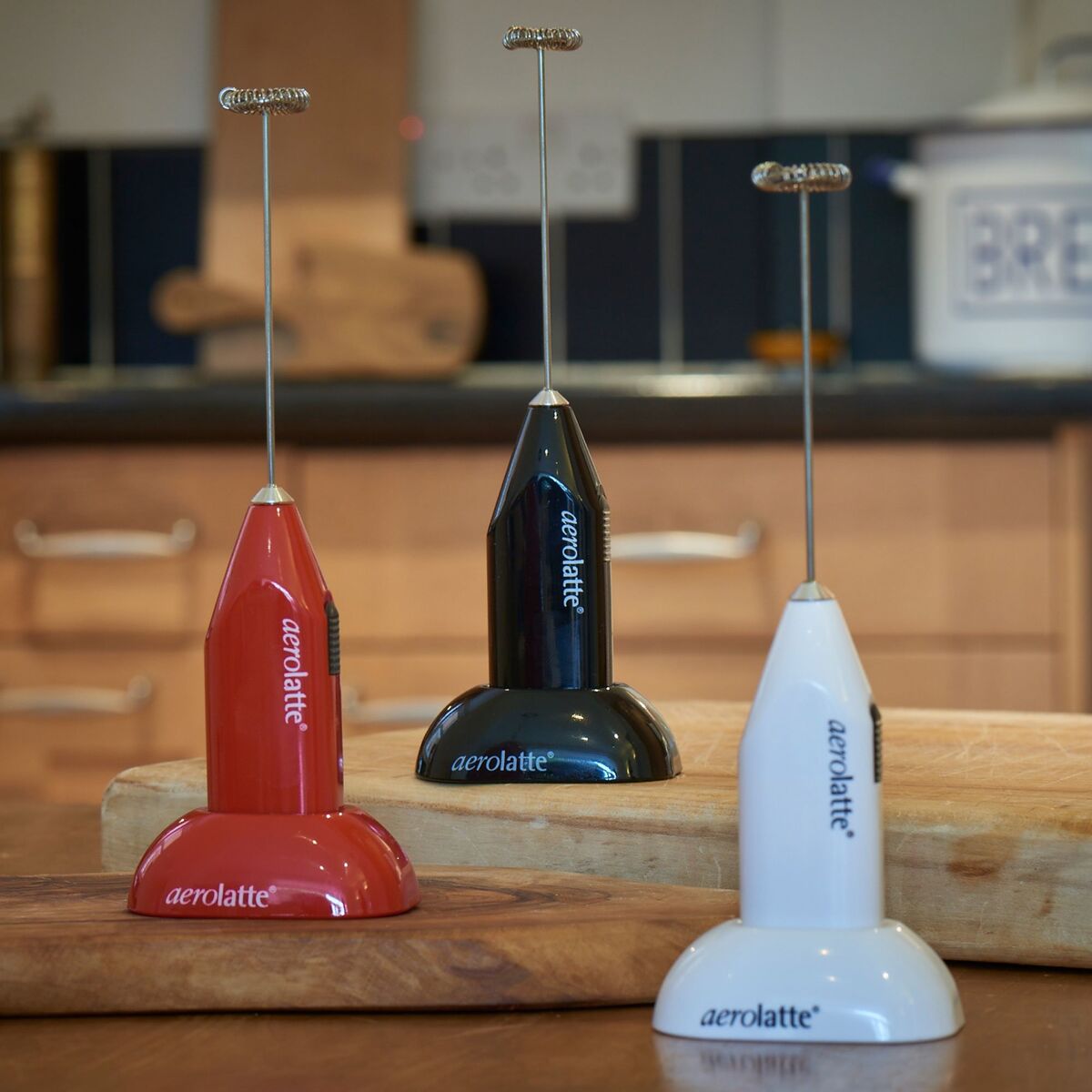 Melkeskummer med holder, rød