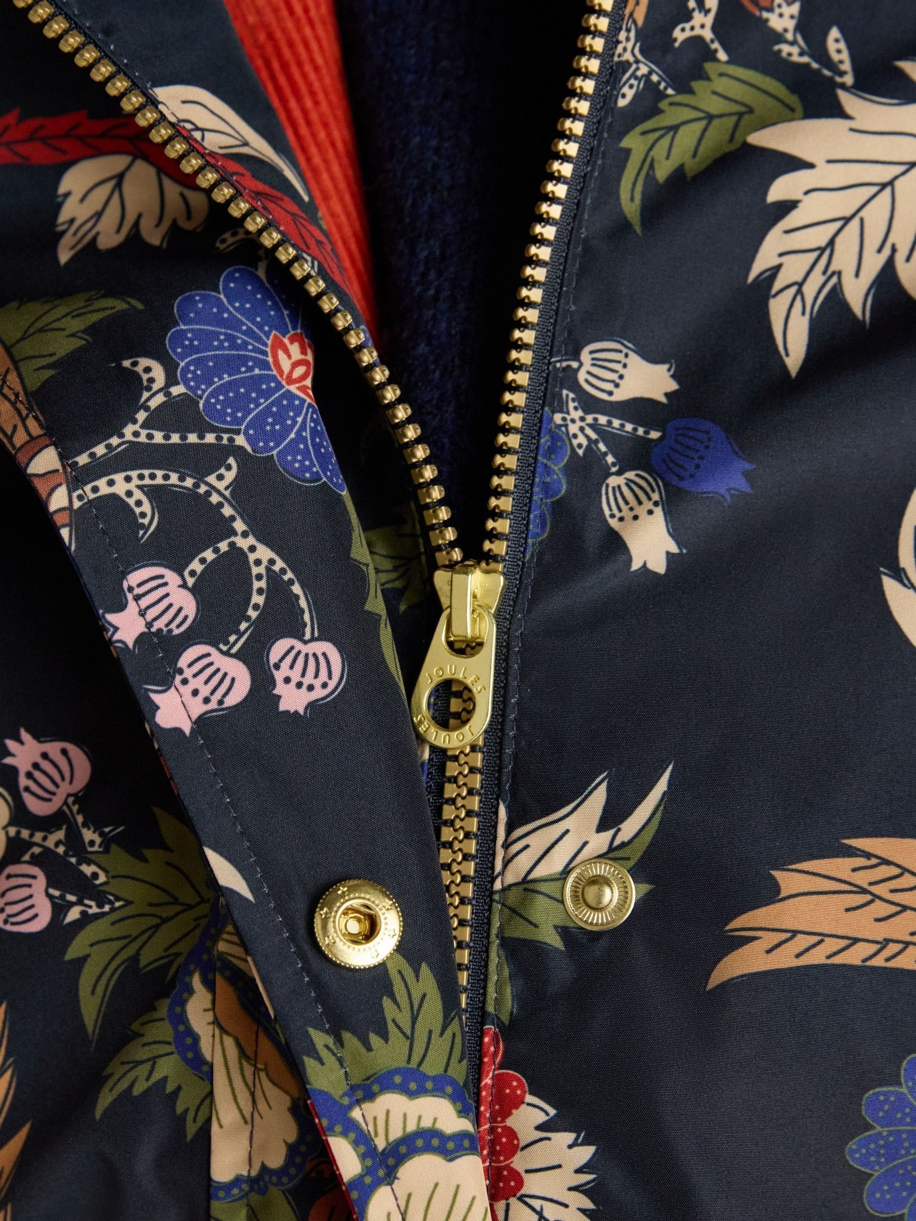 Marineblauw met vogel en bloemenprint - Joules Holkham waterdichte opvouwbare regenjas met capuchon