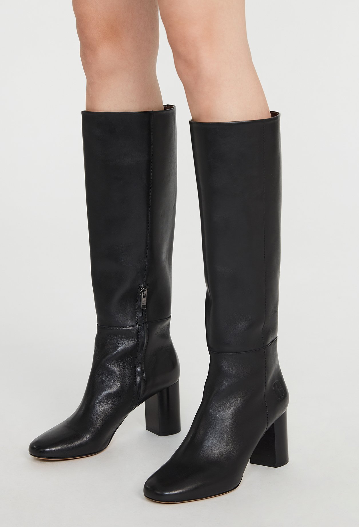 Bottes noires &agrave; talons cuir