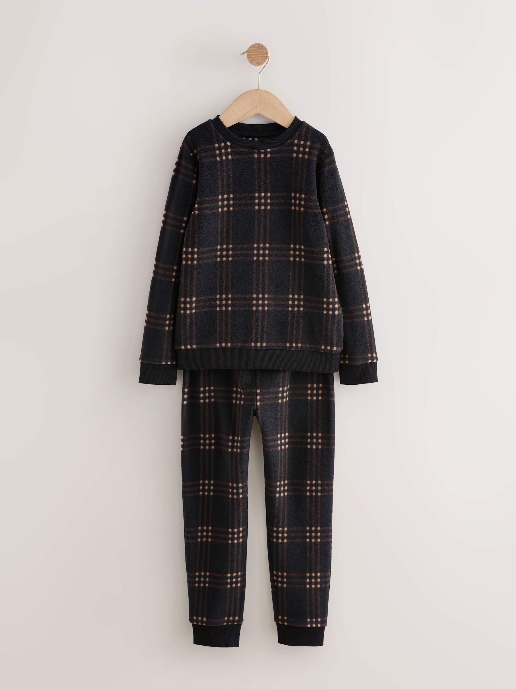 Zwart/ecru geruit - Enkele behaaglijke fleece pyjama (3 - 16 jr)