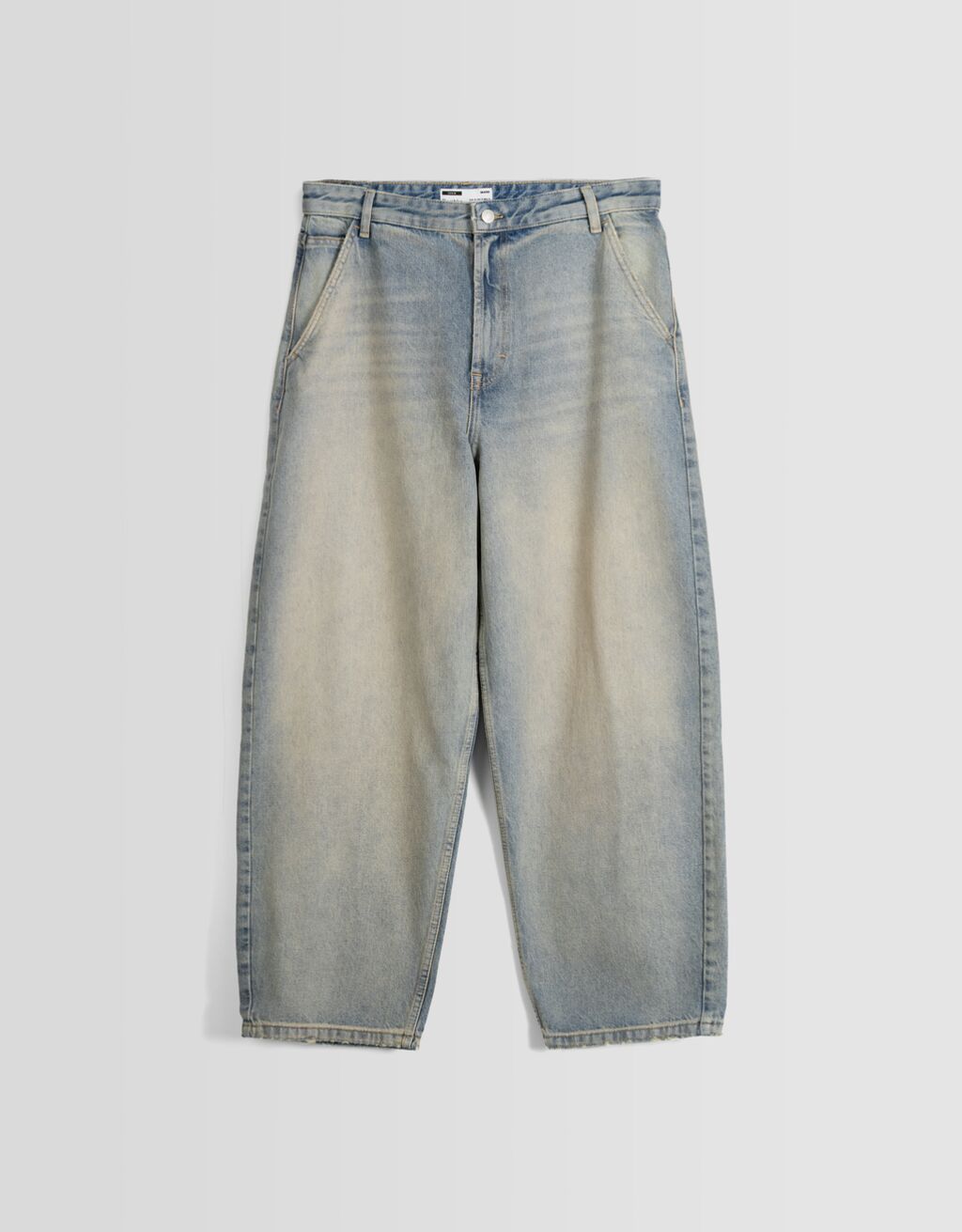 calça jeans estilo skater com efeito desbotado