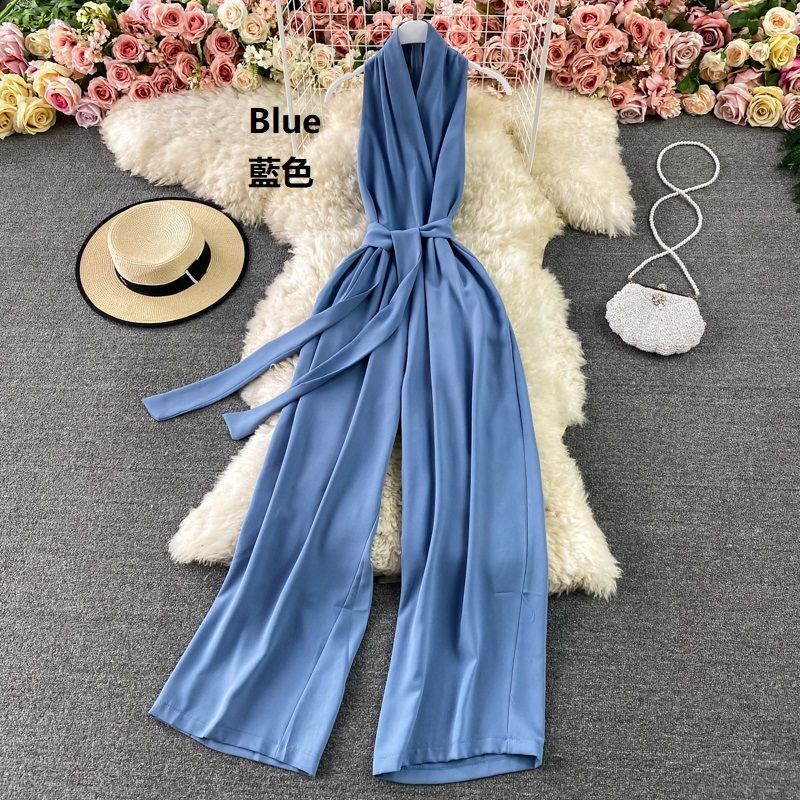 Yearnin - Mouwloze jumpsuit met strikceintuur en wijde pijpen