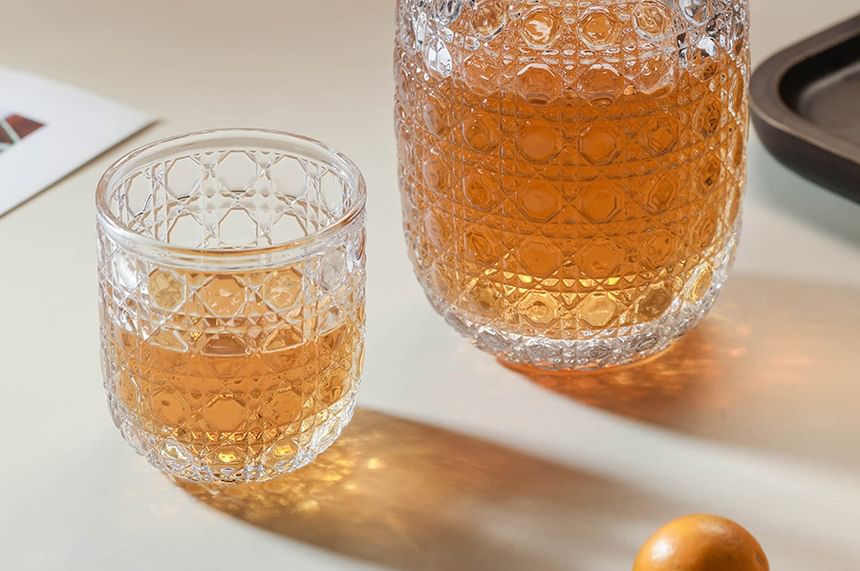 Koringa - Set: Geëmbosseerde glazen fles + drinkbeker