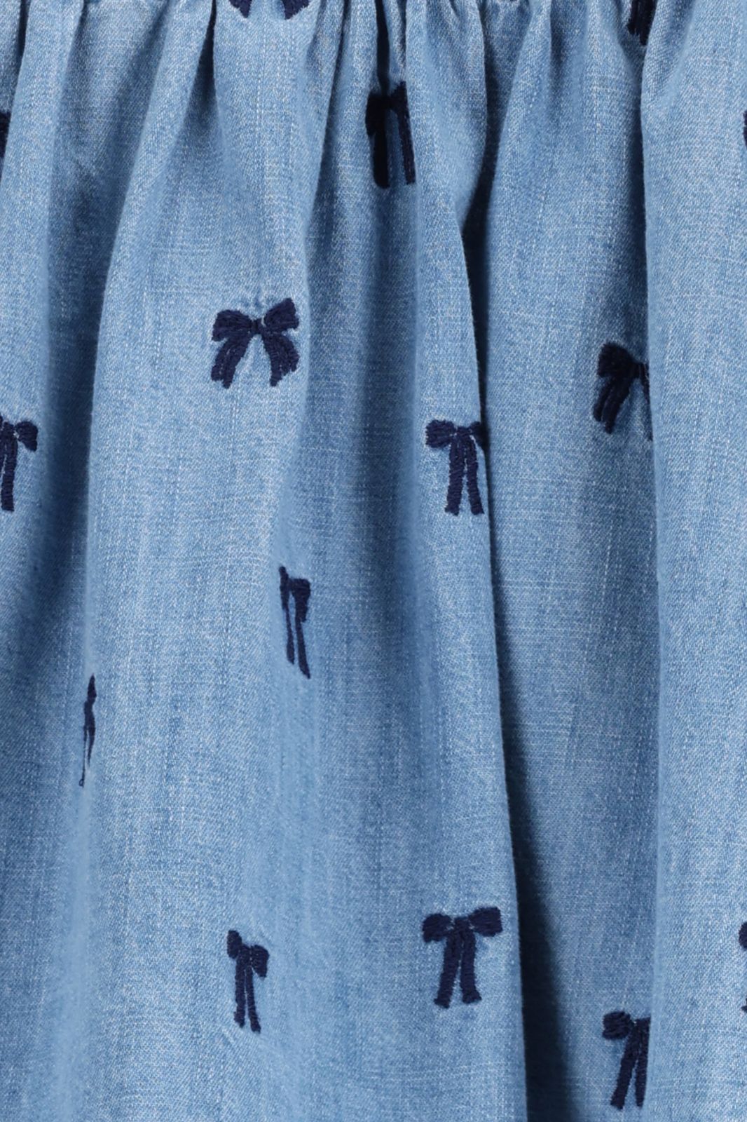 Blauwe rok met strikken embroidery