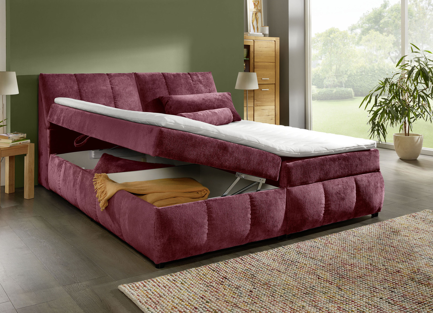 Boxspringbett mit Stauraum im Kopfteil und Bettkasten