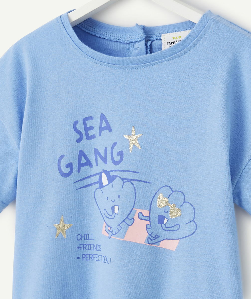 t-shirt bébé fille en coton bio bleu avec motifs coquillages et étoiles pailletées