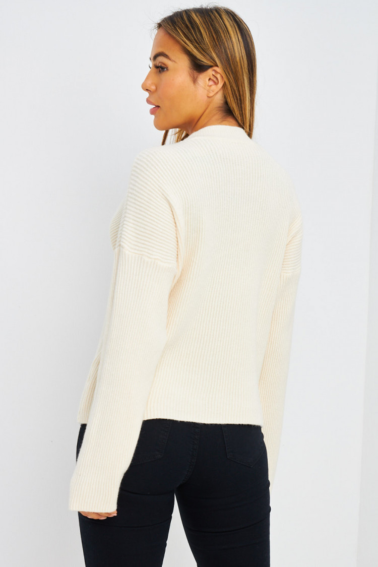 Pull écru en grosses mailles
