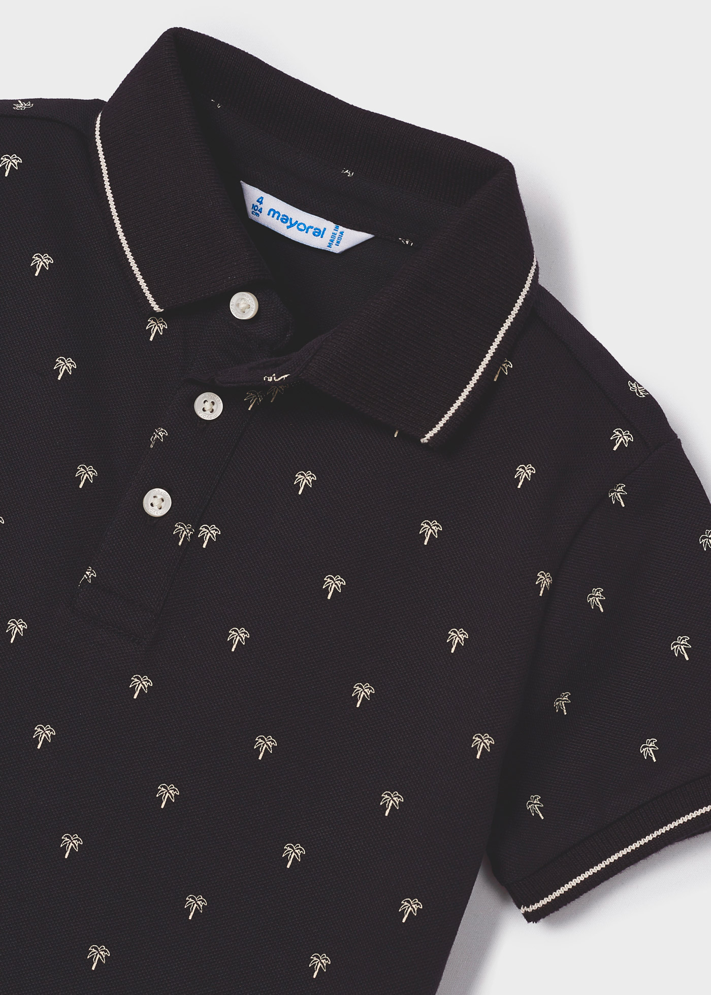 Camisa polo de manga curta com estampa em algodão sustentável para meninos