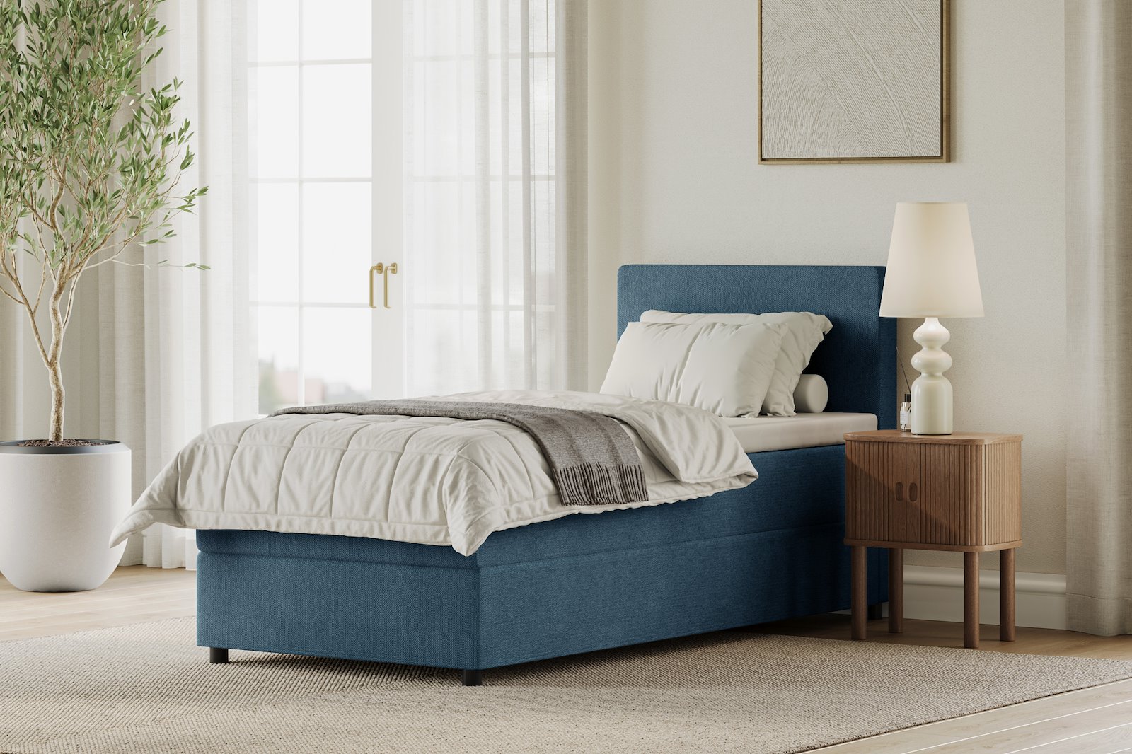 Premium 10 oppbevaringsseng 90x200 cm Magasinseng med oppbevaring, åpnes fra siden. I tekstil terranova 21 blå, med medium fasthetsgrad og premium 10 overmadrass,sorte ben. Sengegavl selges separat.