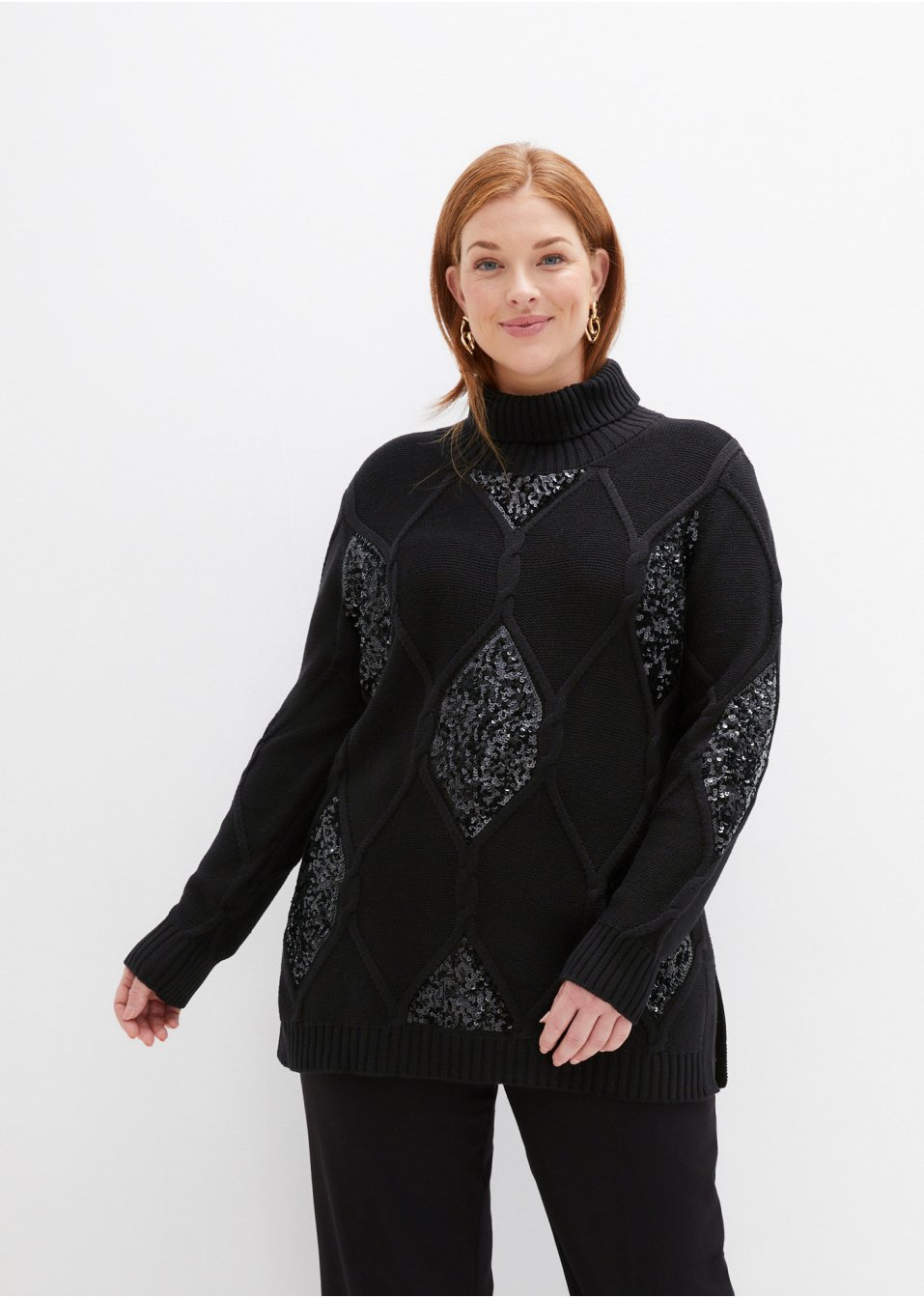 Pull en maille torsadée avec paillettes