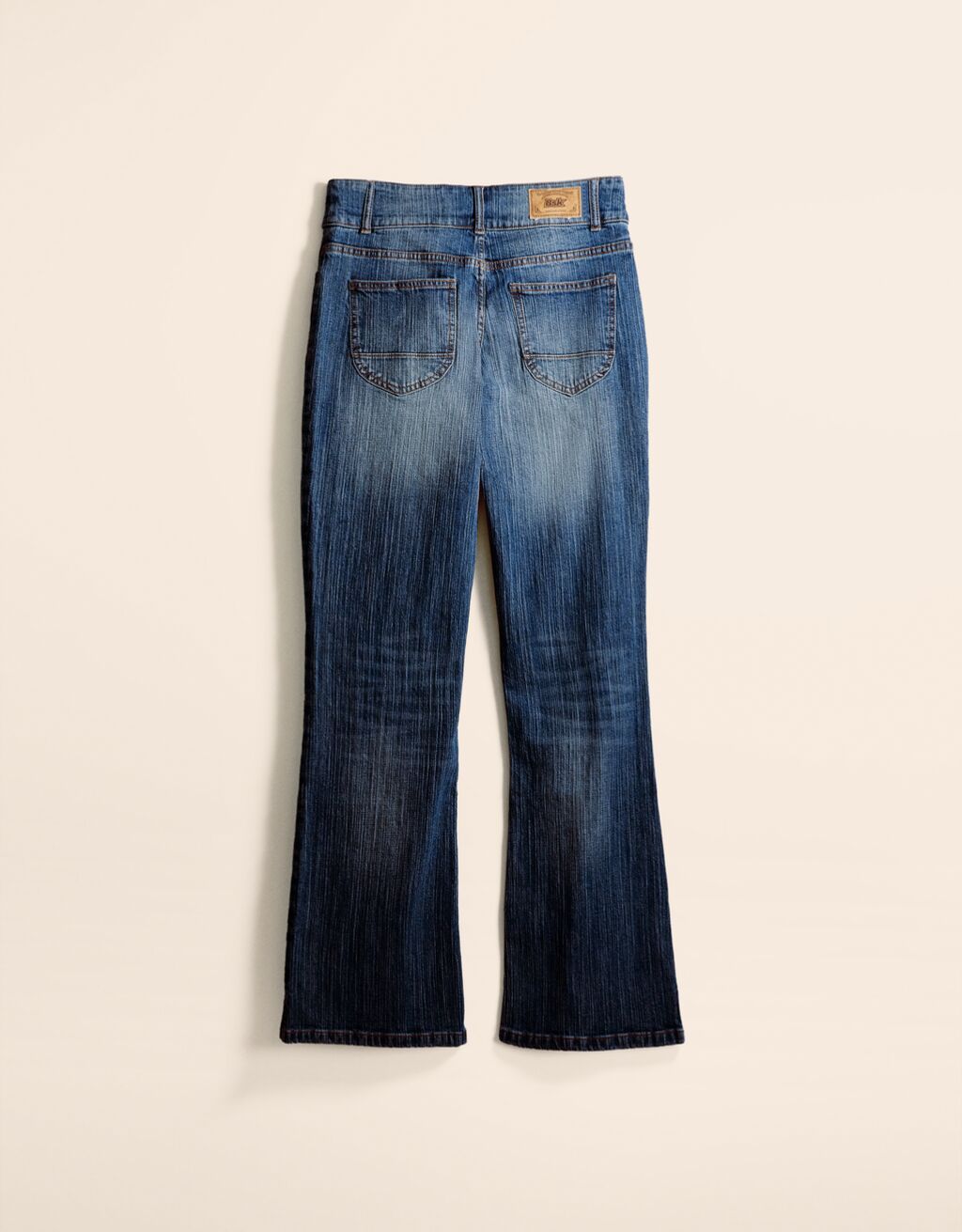 calça jeans flare de cintura baixa