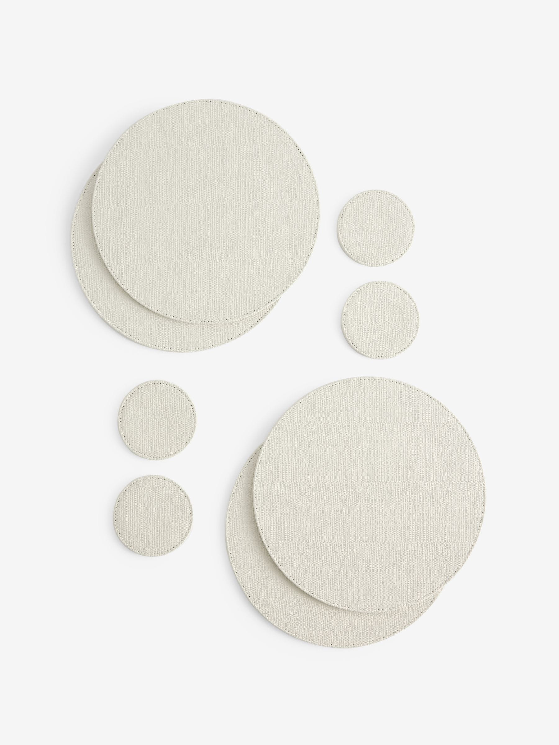 Set van 4 omkeerbare placemats en onderzetters van imitatieleer