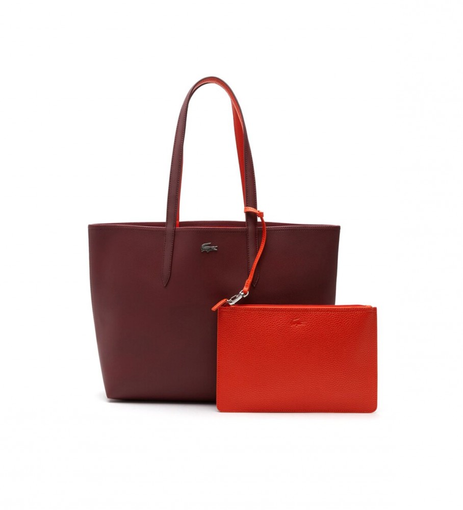 Bolsa Lacoste Anna reversível em dois tons, bordô e vermelha.