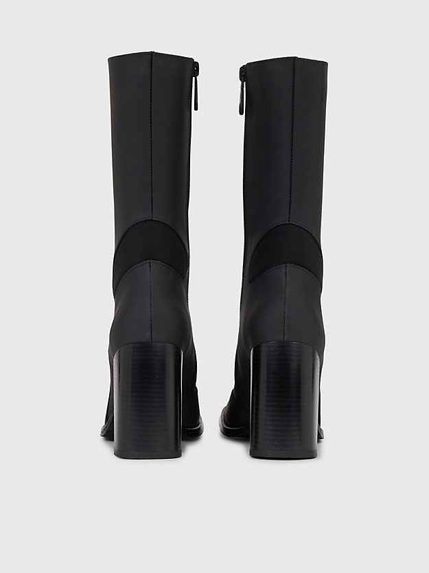 Botas de couro com salto alto