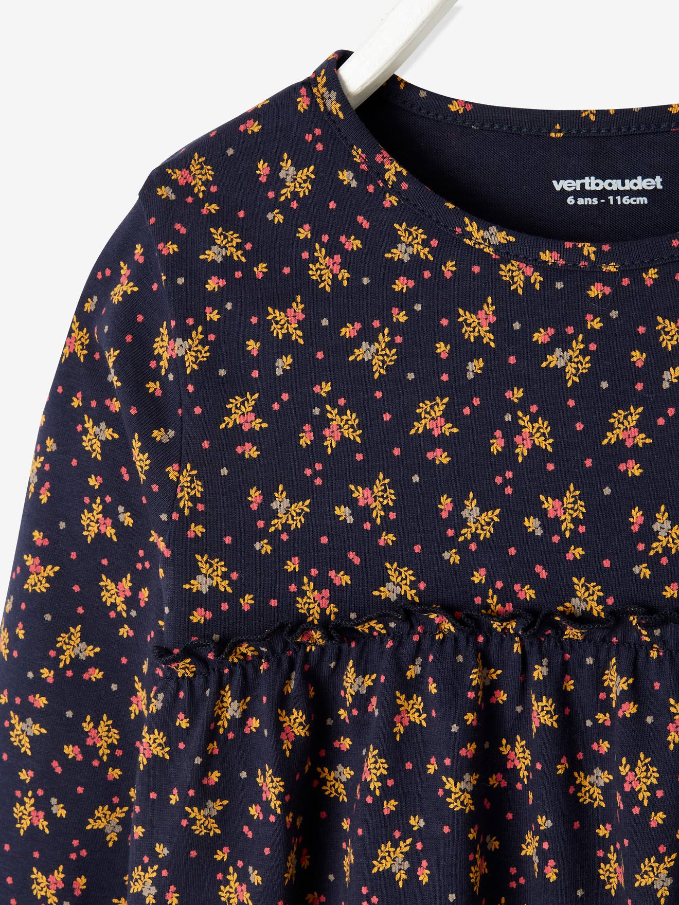 Blusa rosa claro com estampa floral para meninas.
