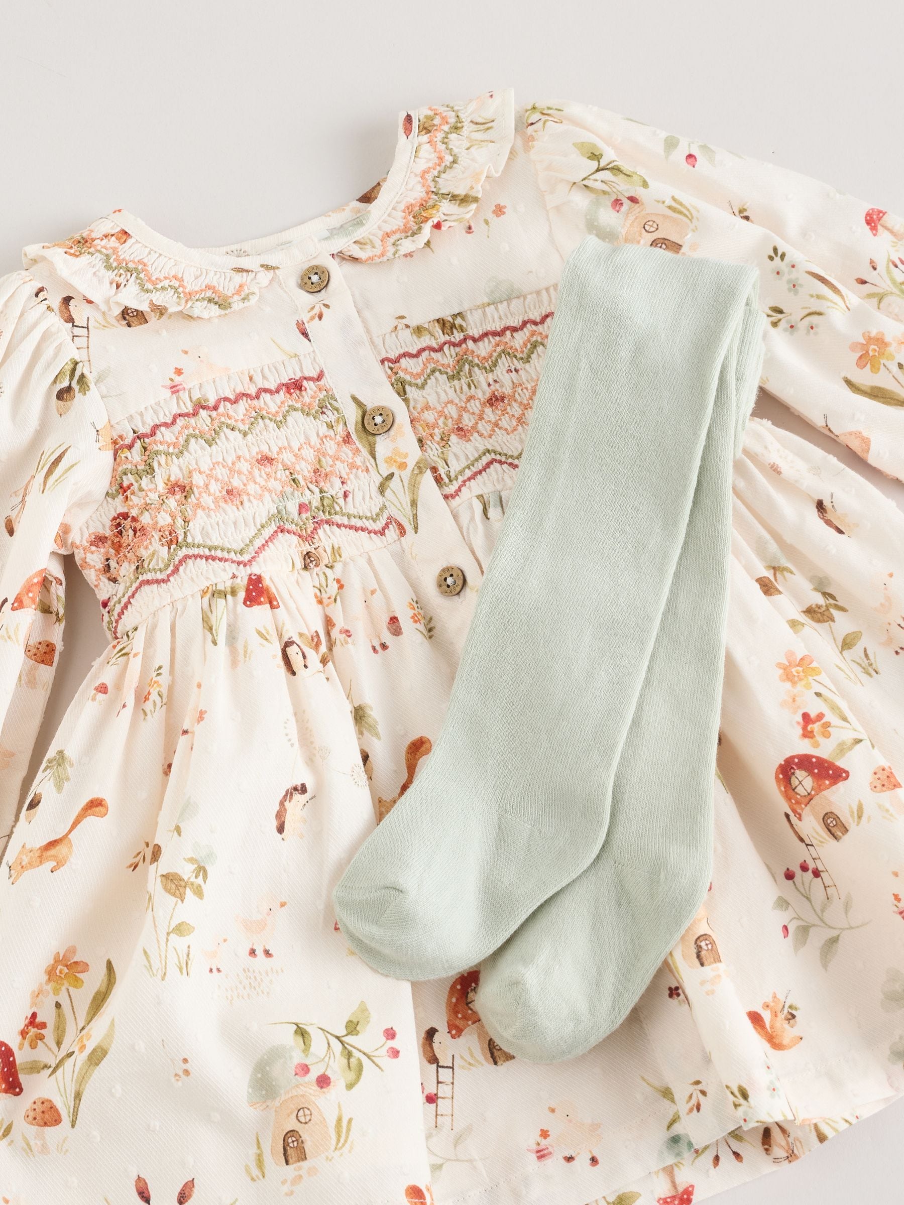 Crème bloemenprint/personage - Collar Baby Dress (0mths-2yrs)
