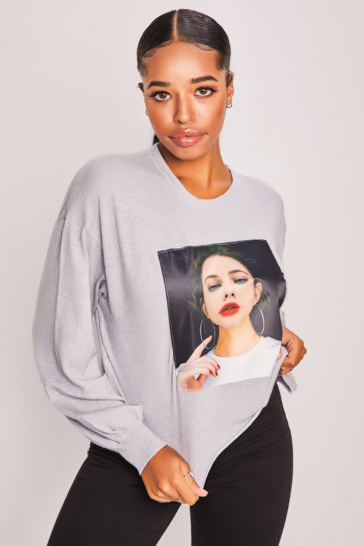 Pull gris tête de femme