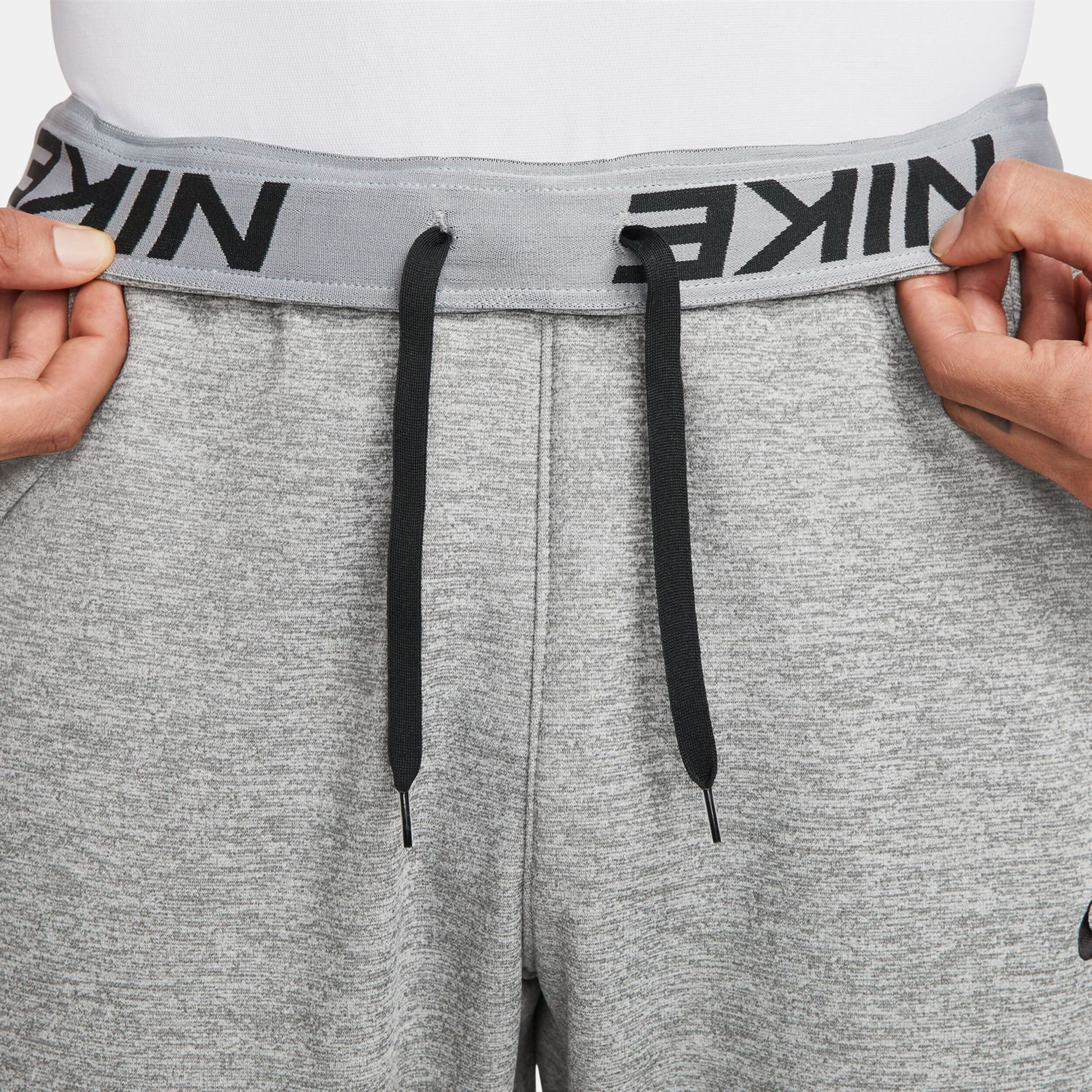 Nike Therma-Fit Pantalon Survêtement Hommes - Gris Clair