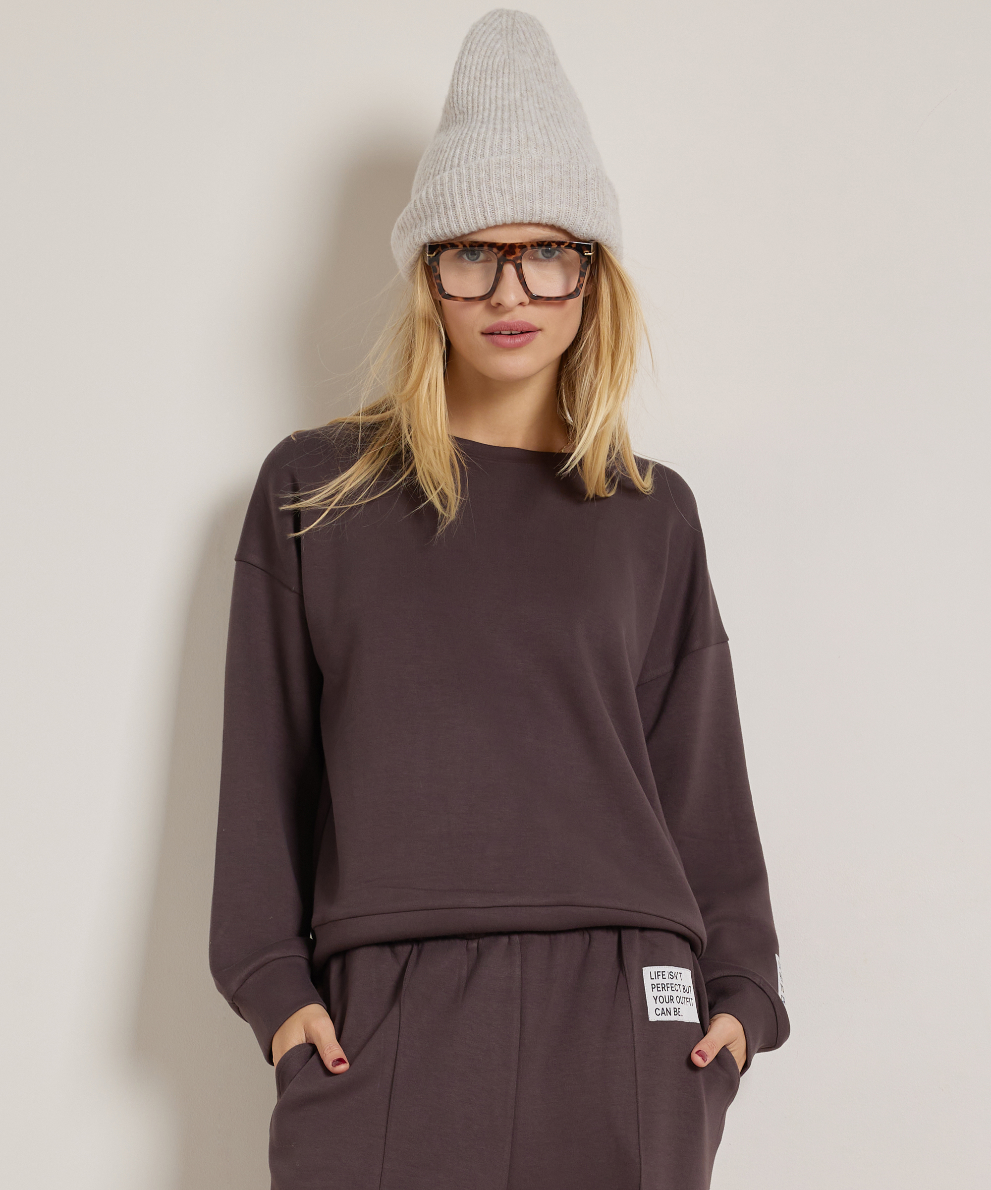 trui met mouwlabel