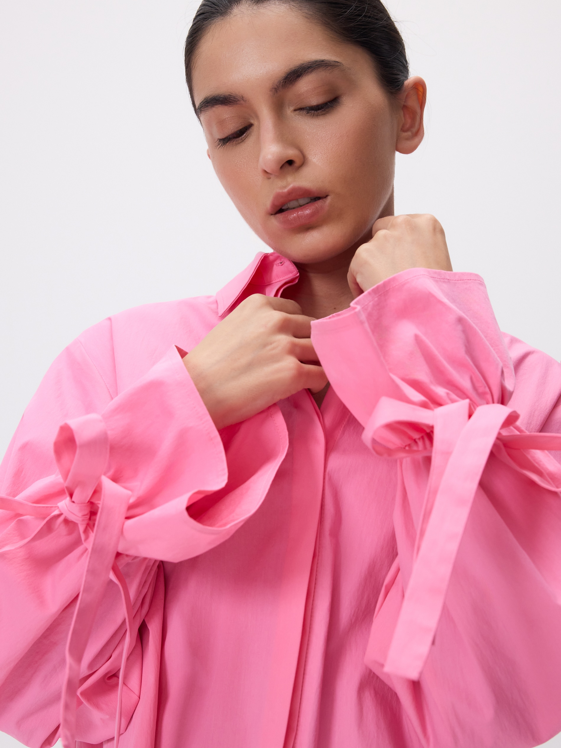 Bluse mit Schluppe an den Ärmeln