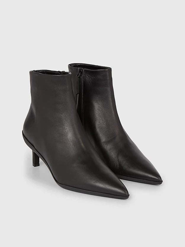 botas de couro até o tornozelo