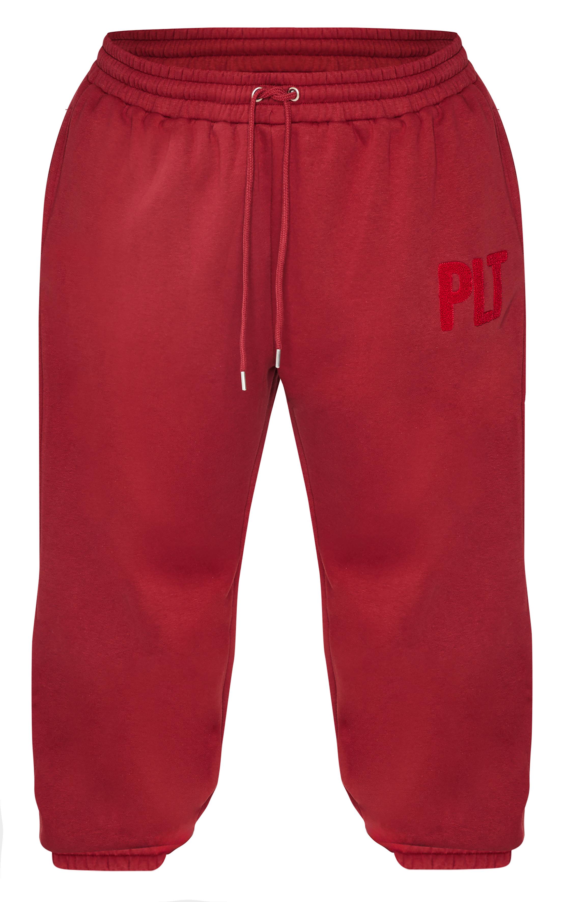 Rouge Foncé Prettylittlething Plus Jogging À Revers Avec Appliqués Imitation Peau De Mouton