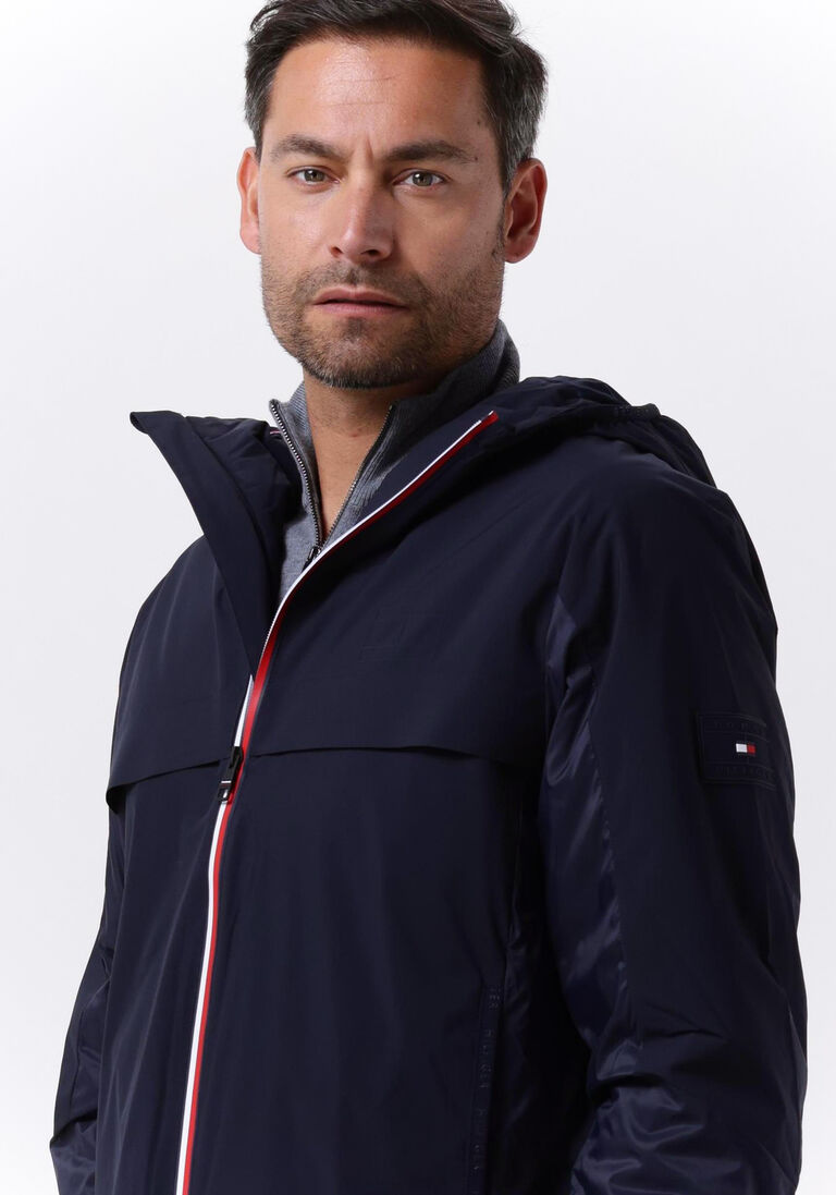 TOMMY HILFIGER donkerblauwe tommy hilfiger regenjas tech hooded rwb zip jacket