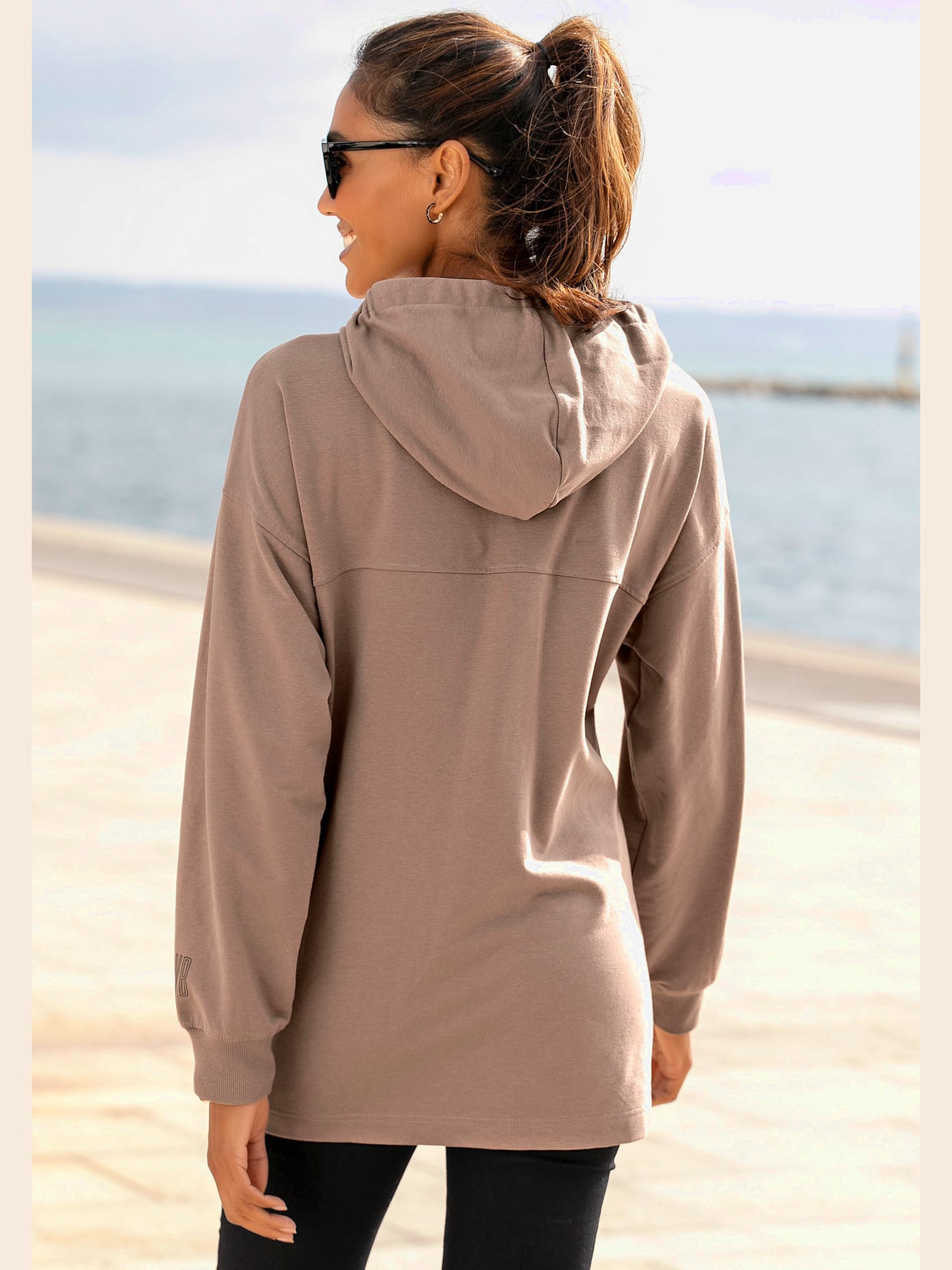 Sweatshirt à capuche capuche doublée avec lien à nouer