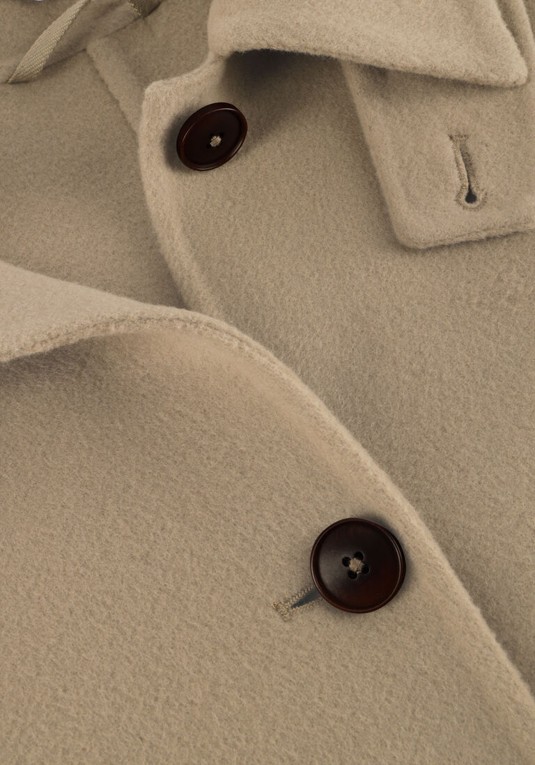beige closed mantel belted coat