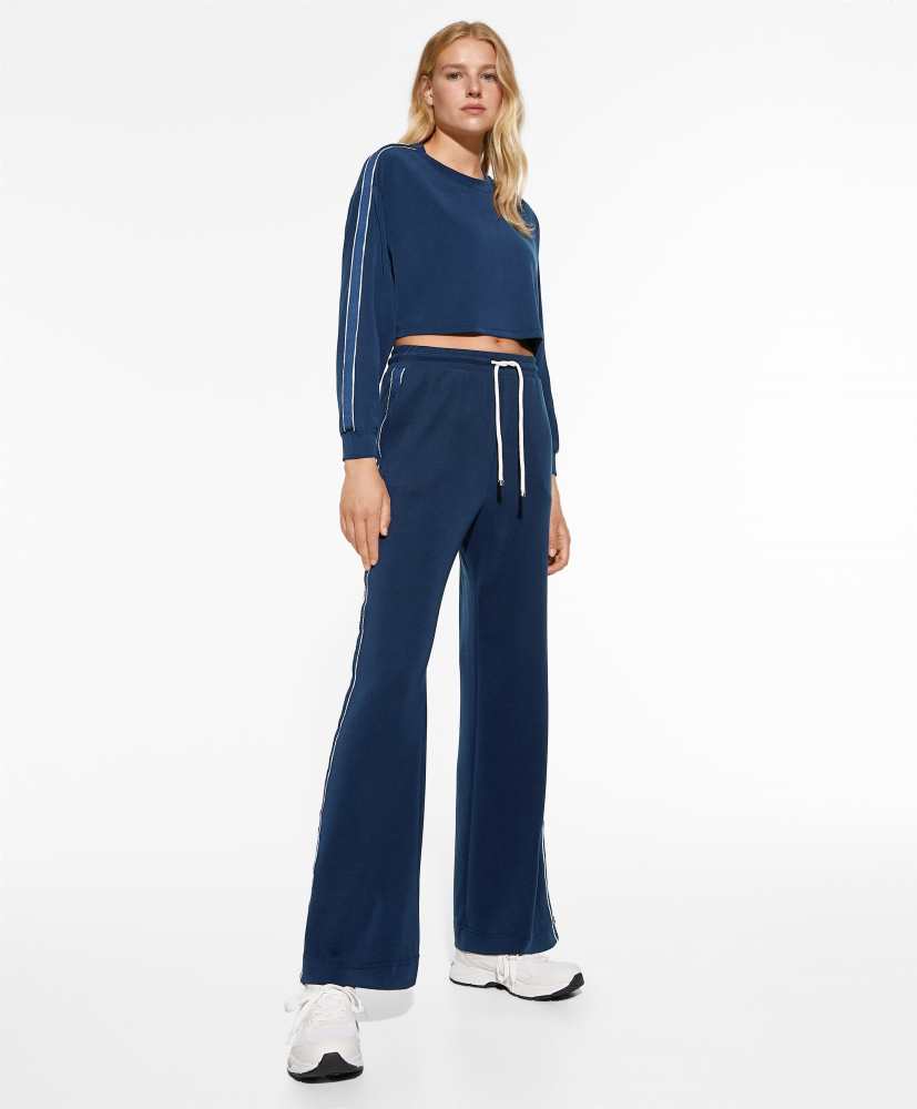 Calça flare em modal com aplique lateral