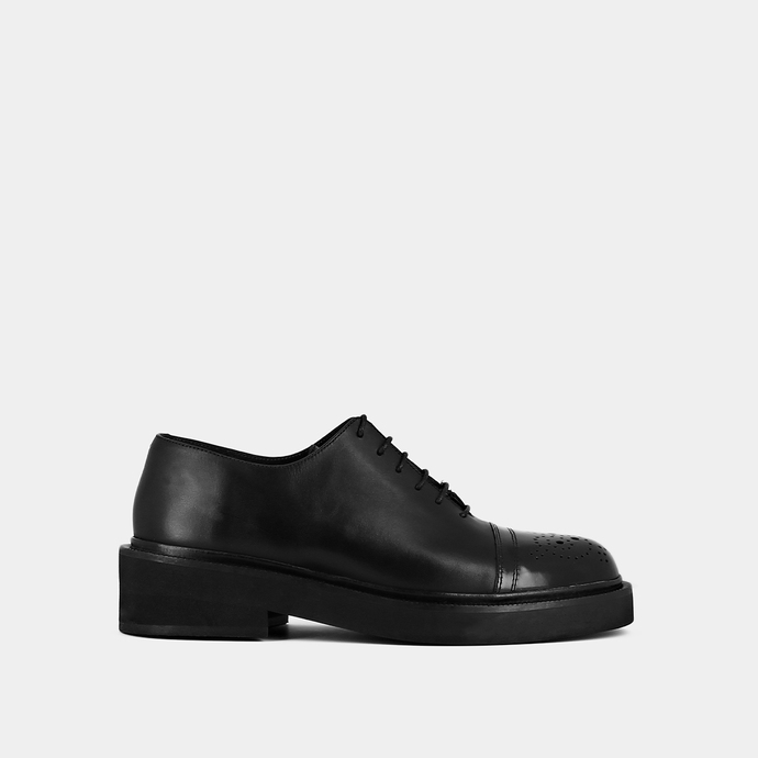 Mocassins à lacets et surpiqures  en cuir noir