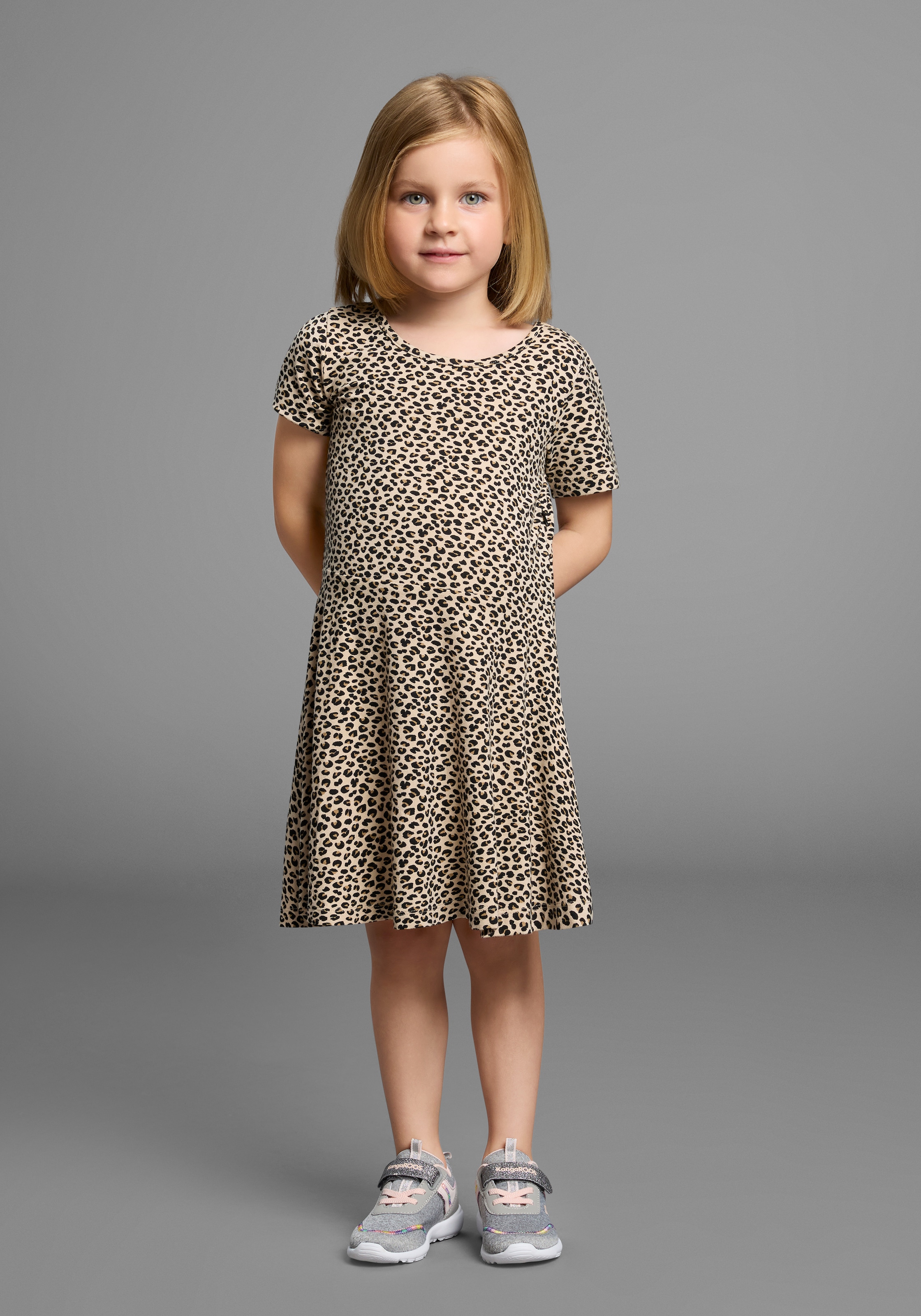 KIDSWORLD Jerseykleid »Shirtkleid in Leo-Musterung« Shirtkleid in Leo-Optik, unten austestellt