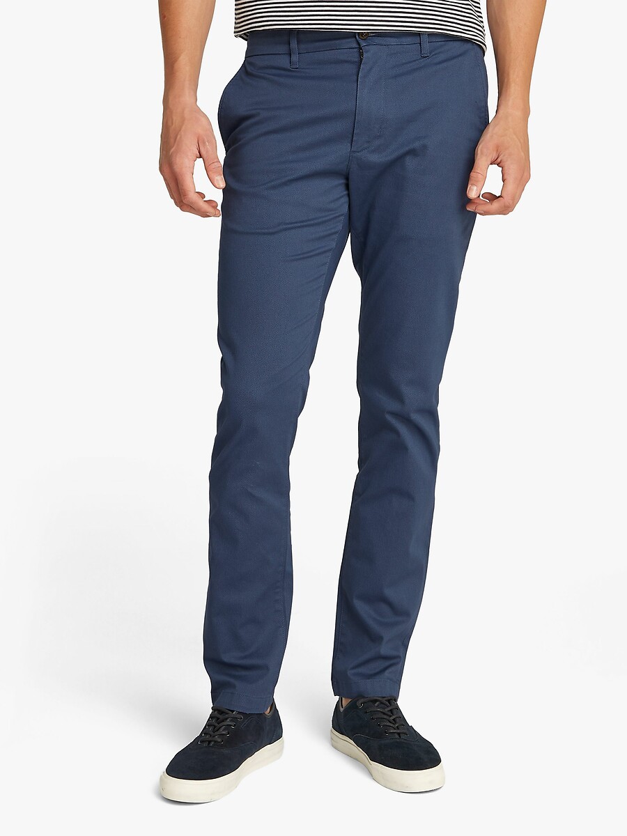 TOMMY HILFIGER<br>Calça chino slim fit Bleecker em malha estruturada