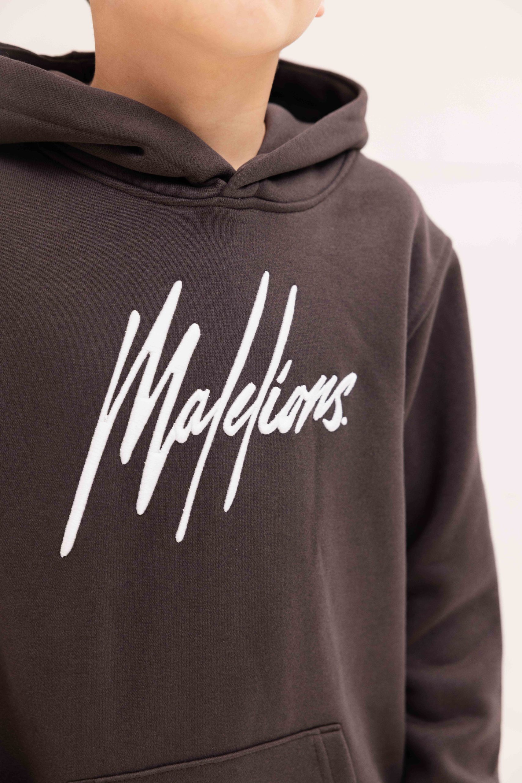 Malelions Essentials Trainingspak Kids Bruin
