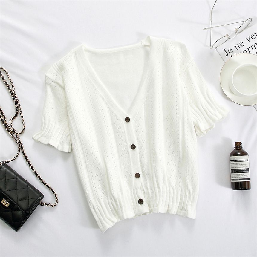 Muezz - Pointelle gebreide cardigan met korte mouwen