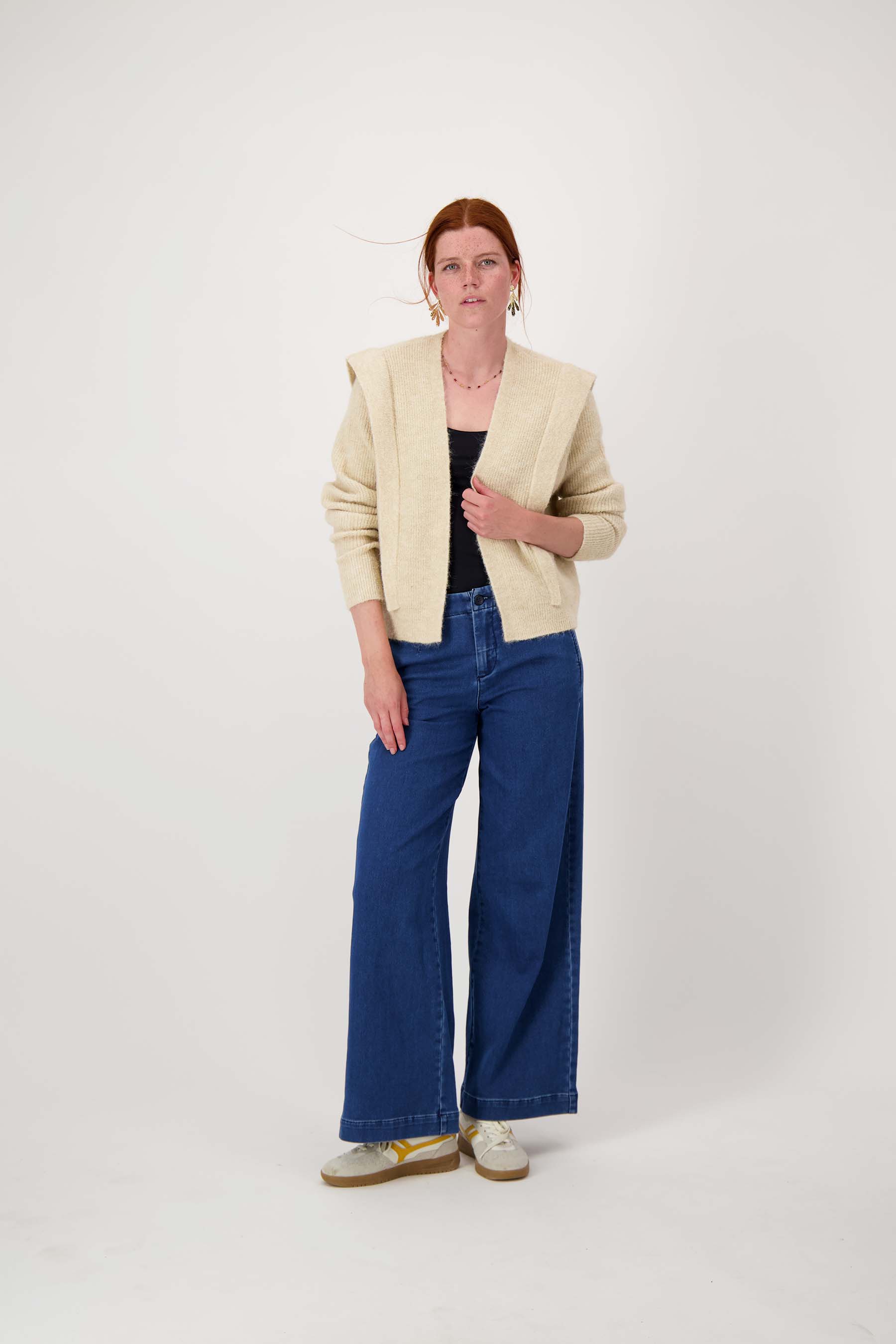 vest met schouder detail