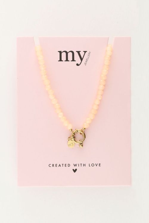 Oranje kralenketting met slotje