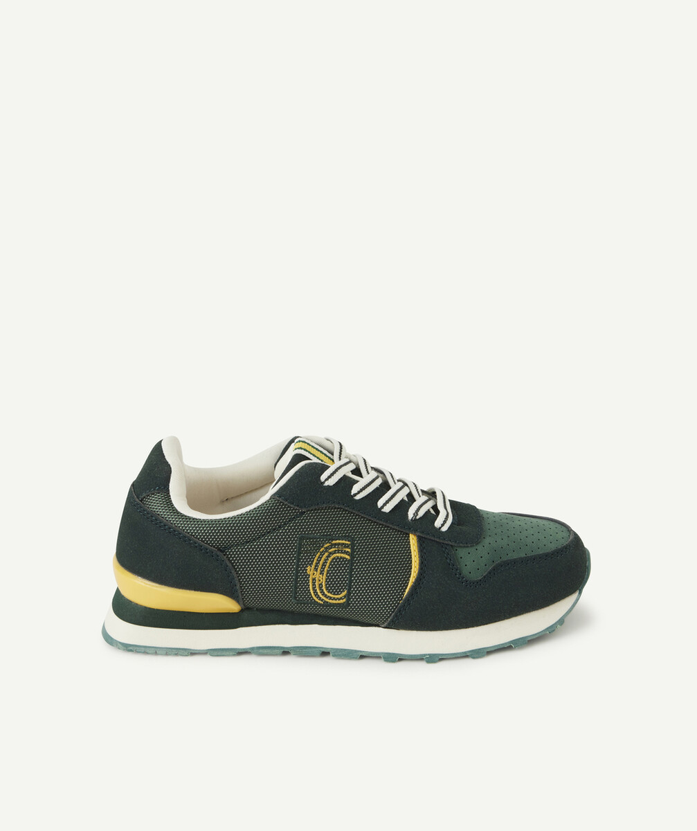 LES BASKETS VERTES AUX LACETS ÉLASTIQUES