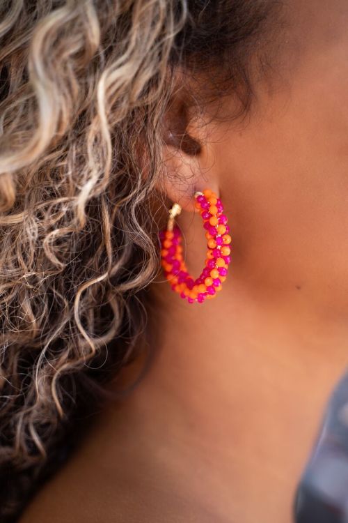 Ronde statement oorbellen met roze & oranje steentjes