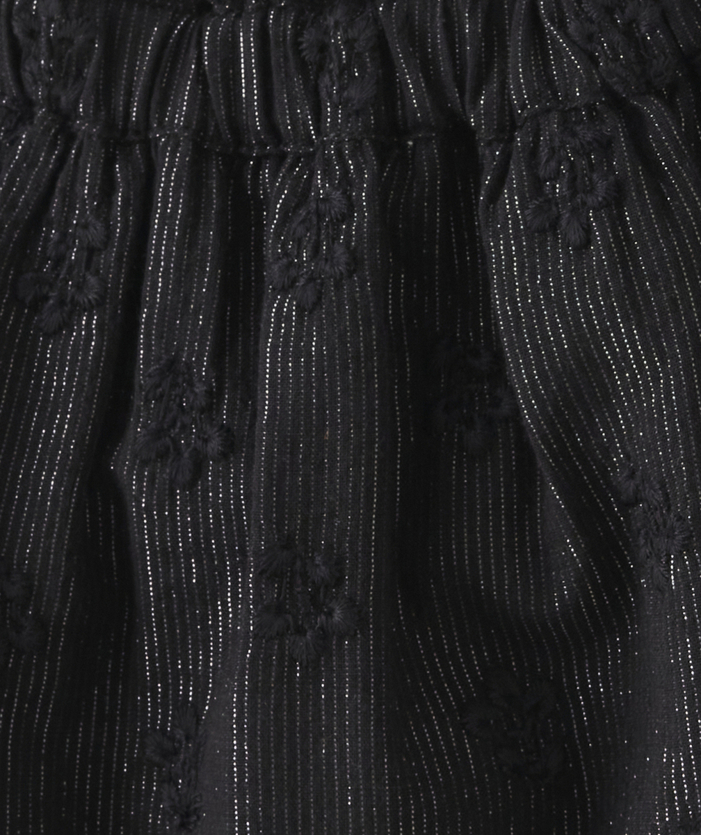 JUPE NOIRE BÉBÉ FILLE AVEC FILS COULEUR ARGENTÉE ET FLEURS EN RELIEF
