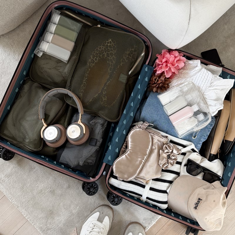 Aries Travel<br>Check in bag med indhold