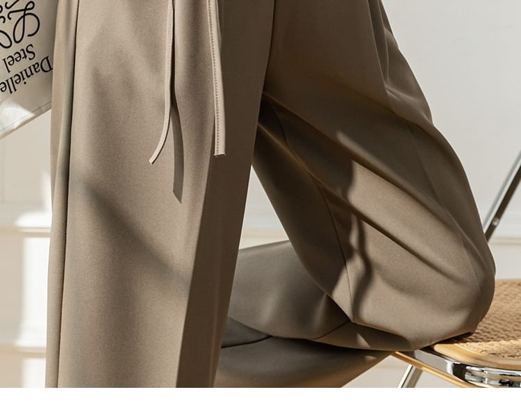 Odestra - Hoge taille effen pantalon met wijde pijpen en zelfstrik