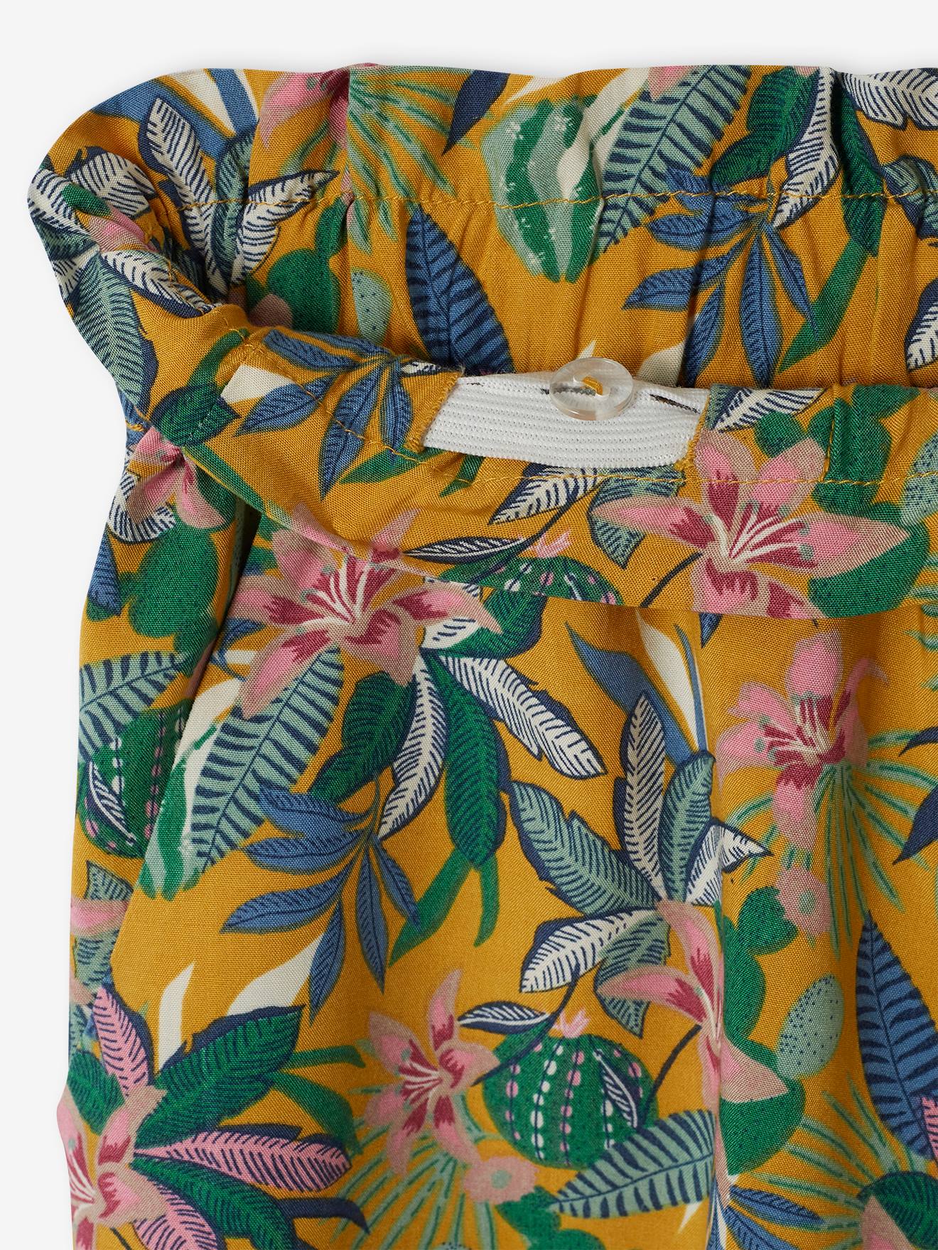 Calças com estampa floral mostarda
