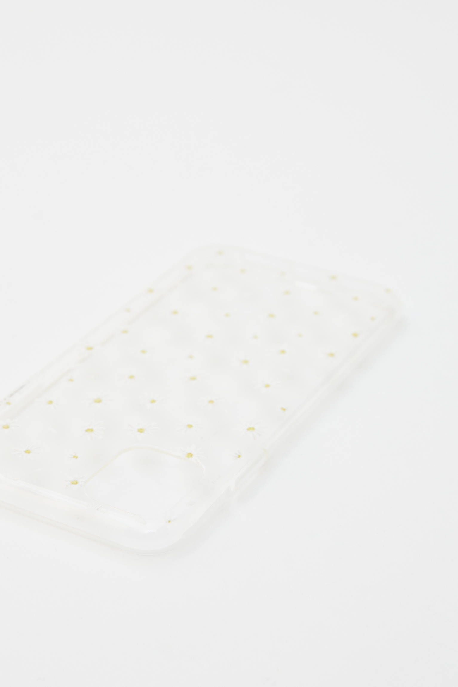 CAPA PARA IPHONE COM MARGARIDAS TRANSPARENTE - BRANCA