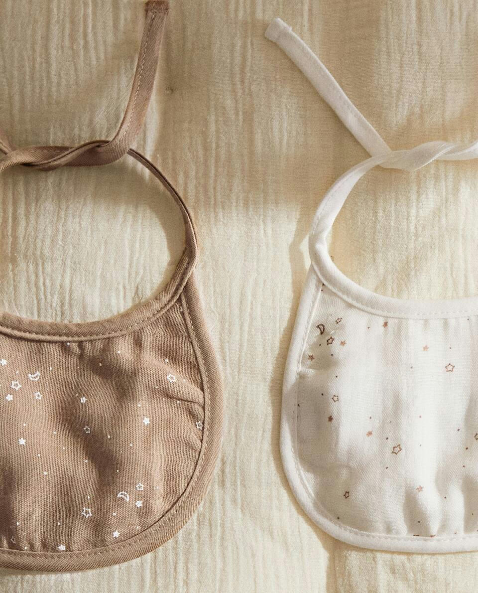 BABADORES DE MUSSELINA COM ESTRELAS (CONJUNTO DE 2)