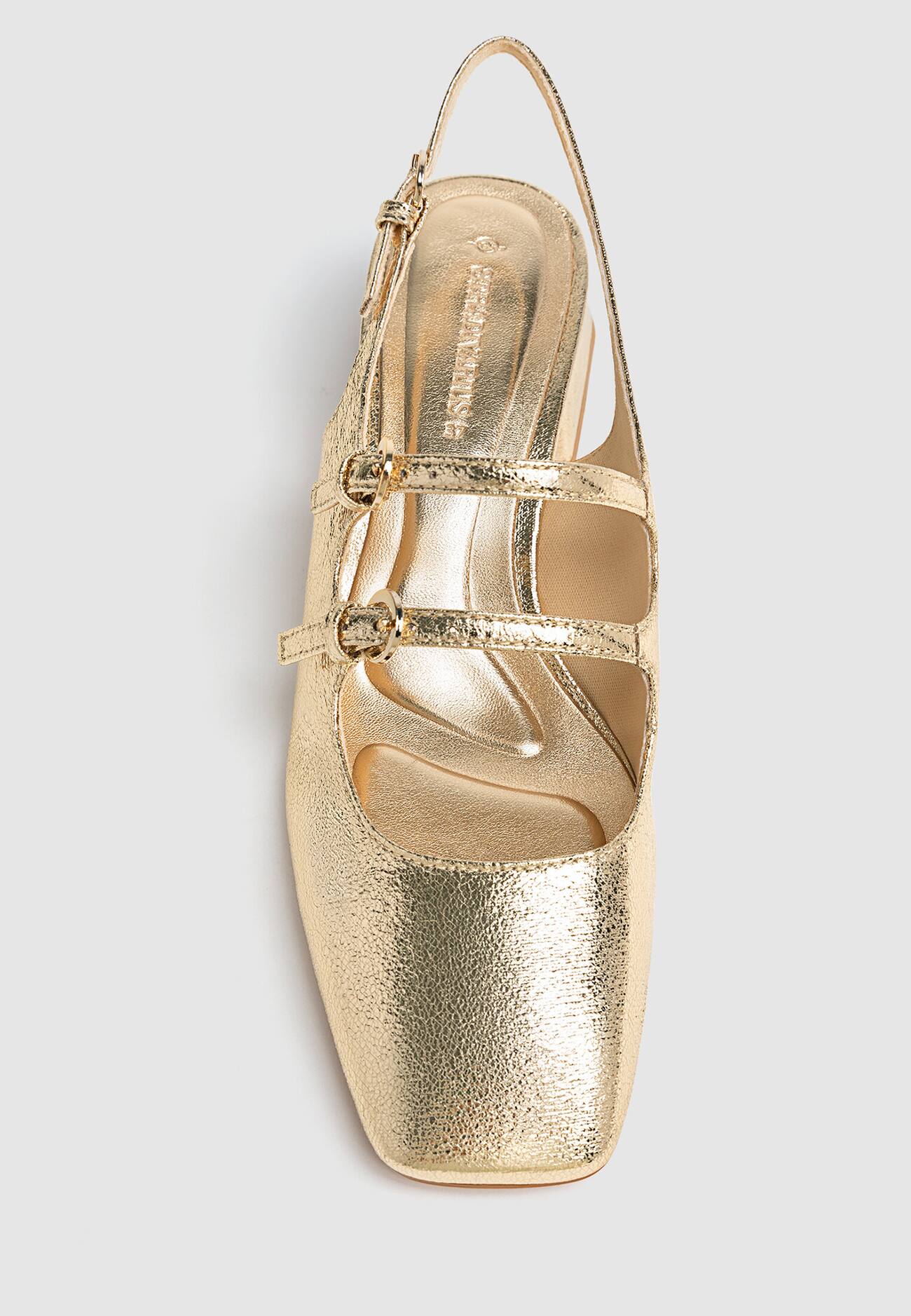 Sapatos dourados de salto alto estilo bailarina