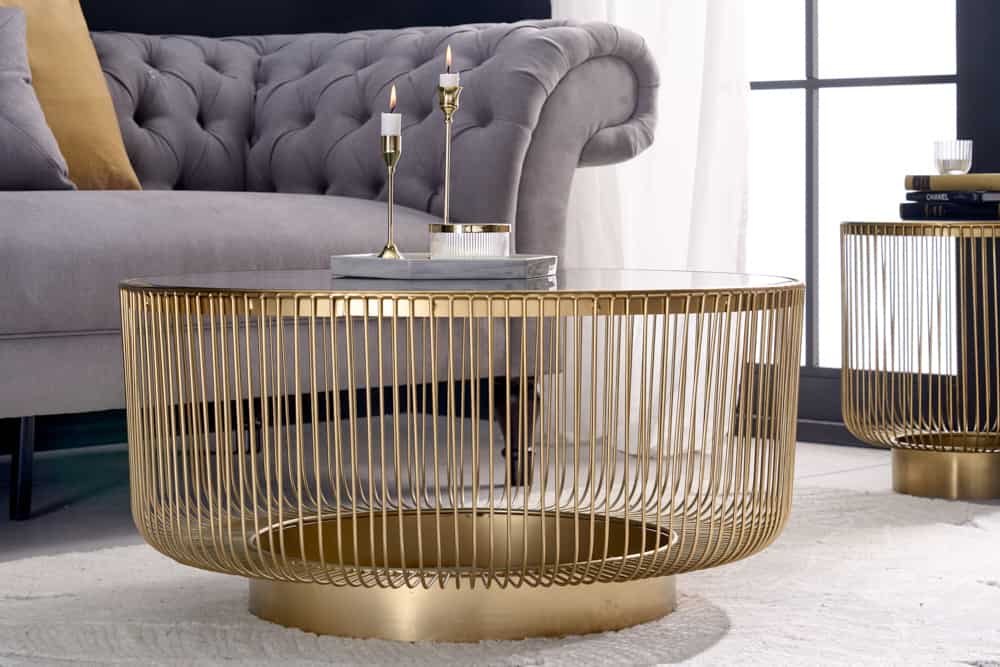 Runder Couchtisch VARIATION 80cm gold Metallgestell Schwarzglas Handarbeit