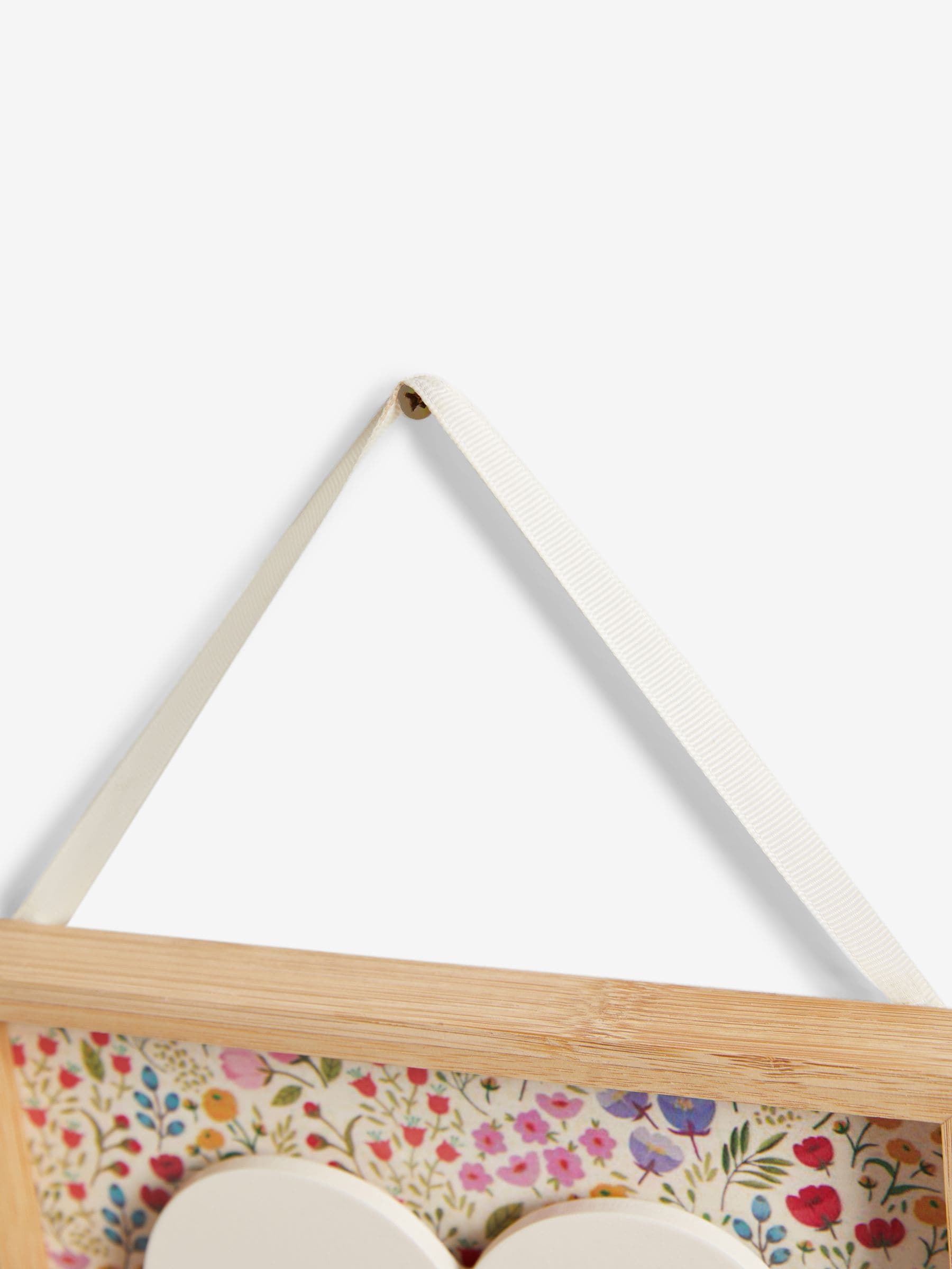 Wanddecoratie met sloganhart en bloemetjesprint