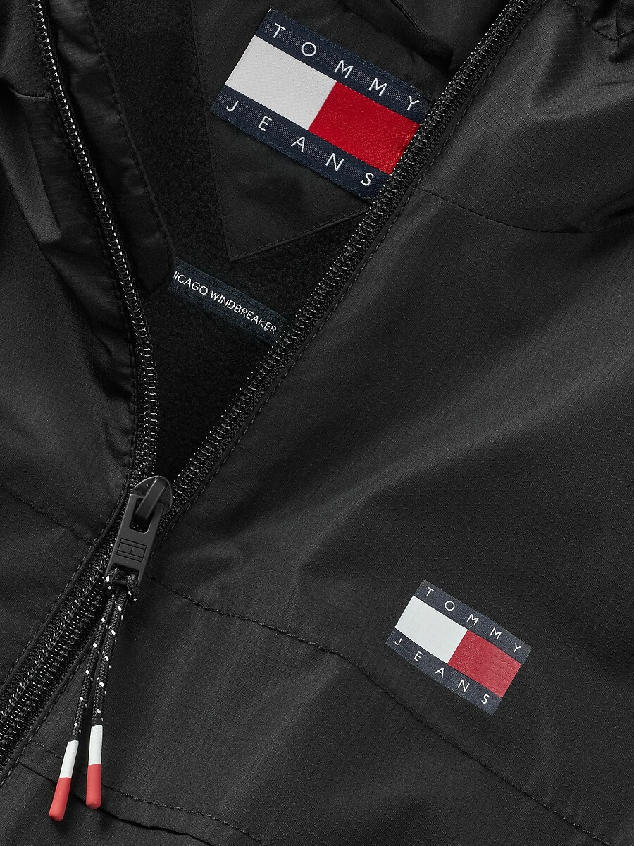 TOMMY JEANS<br>Jaqueta leve com zíper e capuz