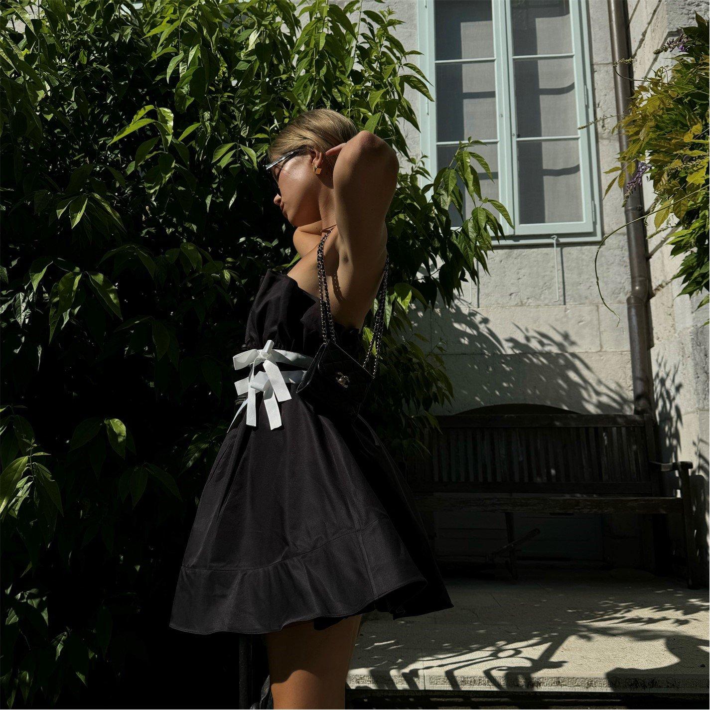 Collective The Label Black Sleeveless Bow Mini Dress